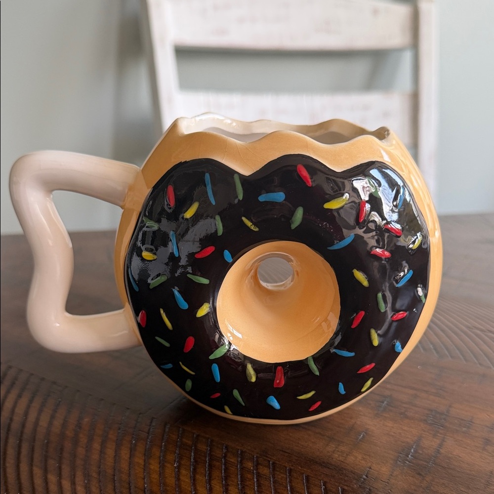 Playful Yellow Donut-Shaped Ceramic Mug with Black Frosting